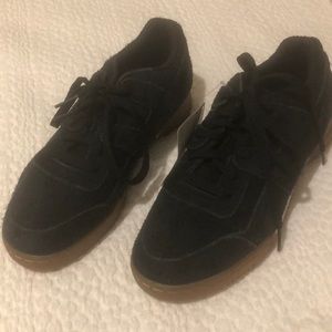 Black Reebok sneakers